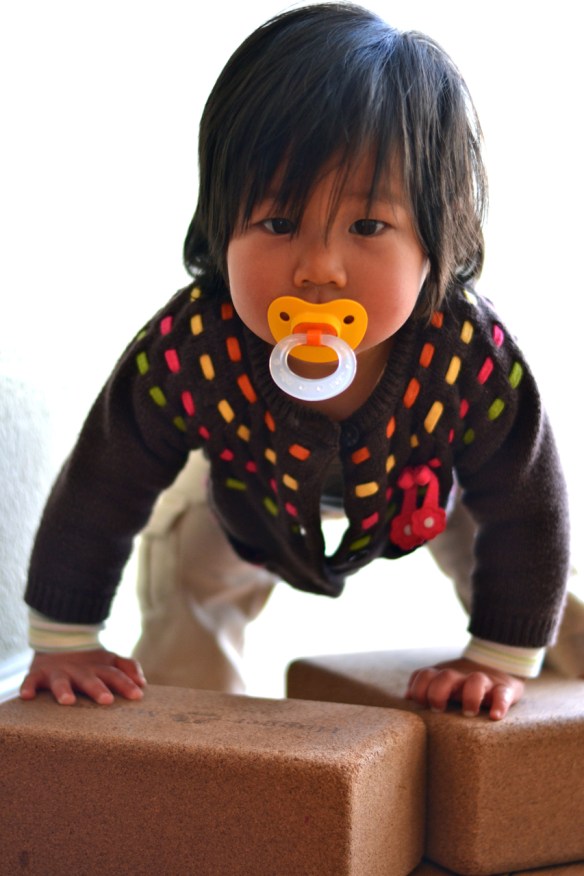 baby yogi with blocks - photo credit: vanessa vichit-vadakan