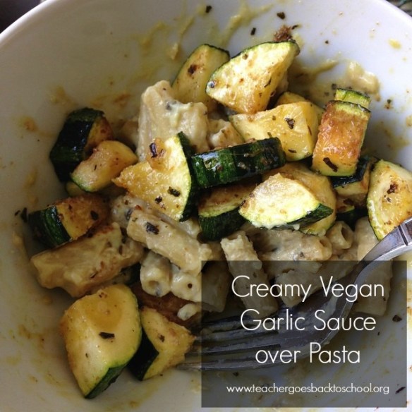 creamy vegan garlic sauce over pasta